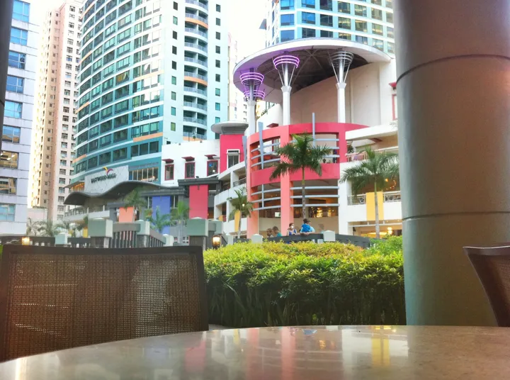 View of Eastwood City from a coffee shop patio